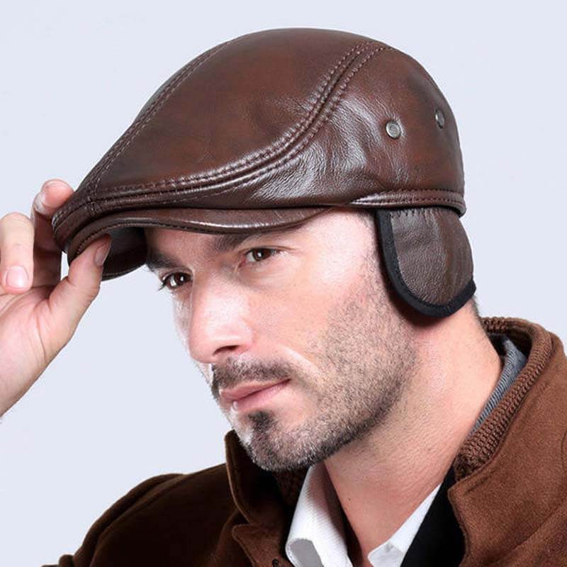 Herren Vintage echte Rindsleder Baskenmütze Kappen Ohrenklappen Winddichter Entenschnabel Warme schwarzbraune Hüte