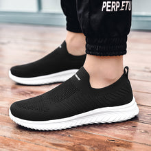 Lade das Bild in den Galerie-Viewer, draussenfeet strickschuhe 31556 schwarz und weiss
