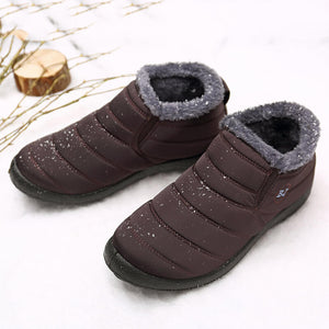 Calientes raquetas de nieve para hombres Feed de pelaje al aire libre zapatos de invierno anti-deslizamiento de botín liviano